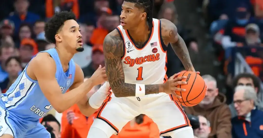Louisville builds, Mark Pope's Kentucky falters in portal.
